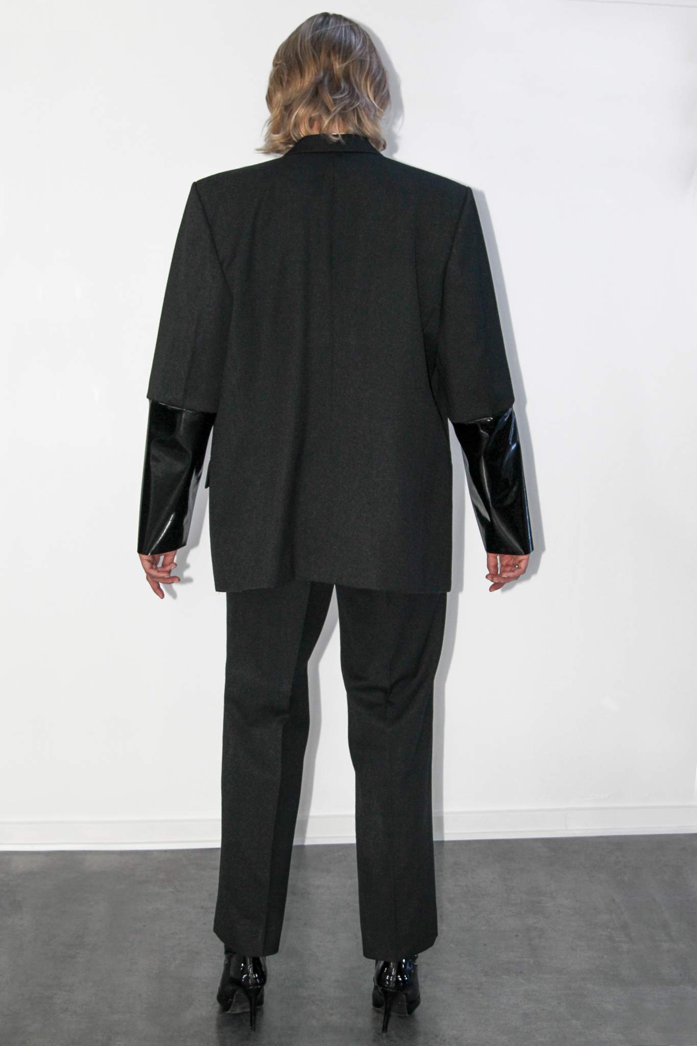 Black vinyl suit